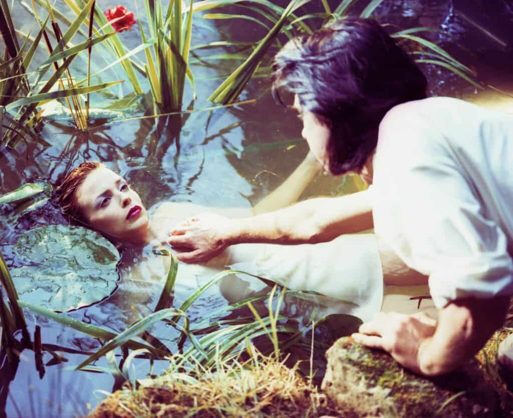 Nick Cave and Kylie Minogue making a video for their duet 'Where the Wild Roses Grow' from the album 'Murder Ballads', United Kingdom, 24th July 1995. (Photo by Dave Tonge/Getty Images)