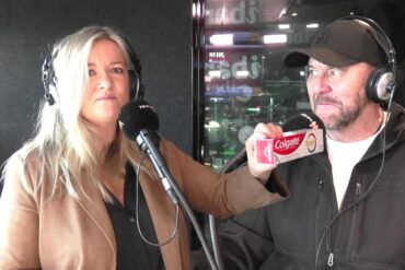 Tanya holding a packet of toothpaste and Steve looking.